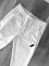 Pantaloni de trening albi conici 12604 115-1
