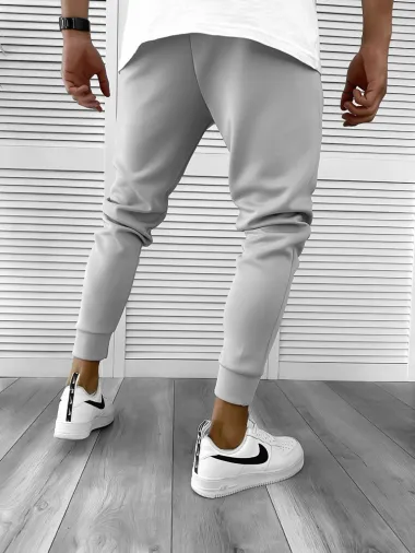 Pantaloni de trening gri conici, silon, cu mic defect 12361 O3-4.2